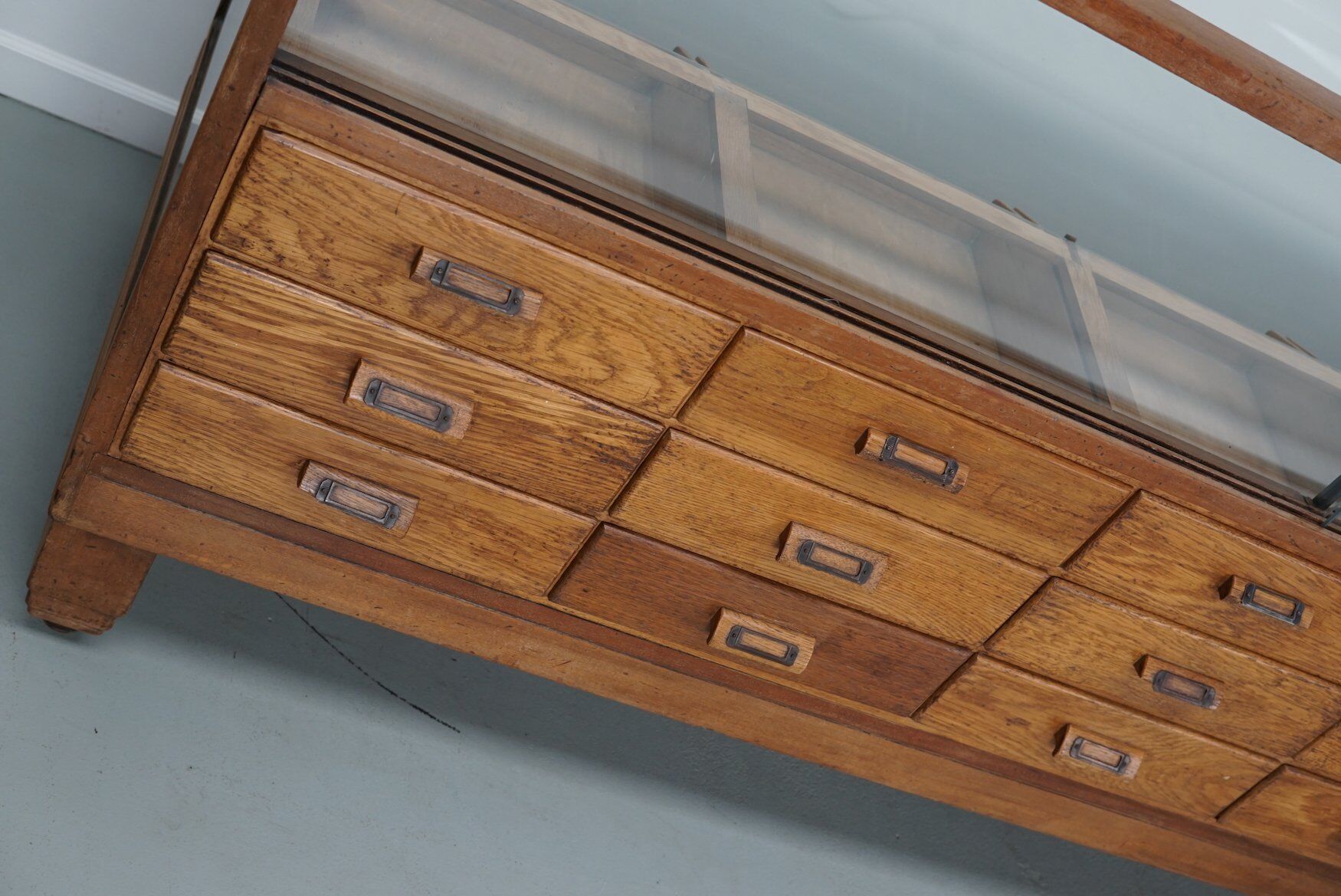 Antique British oak haberdashery cabinet, 1930s