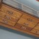 Antique British oak haberdashery cabinet, 1930s