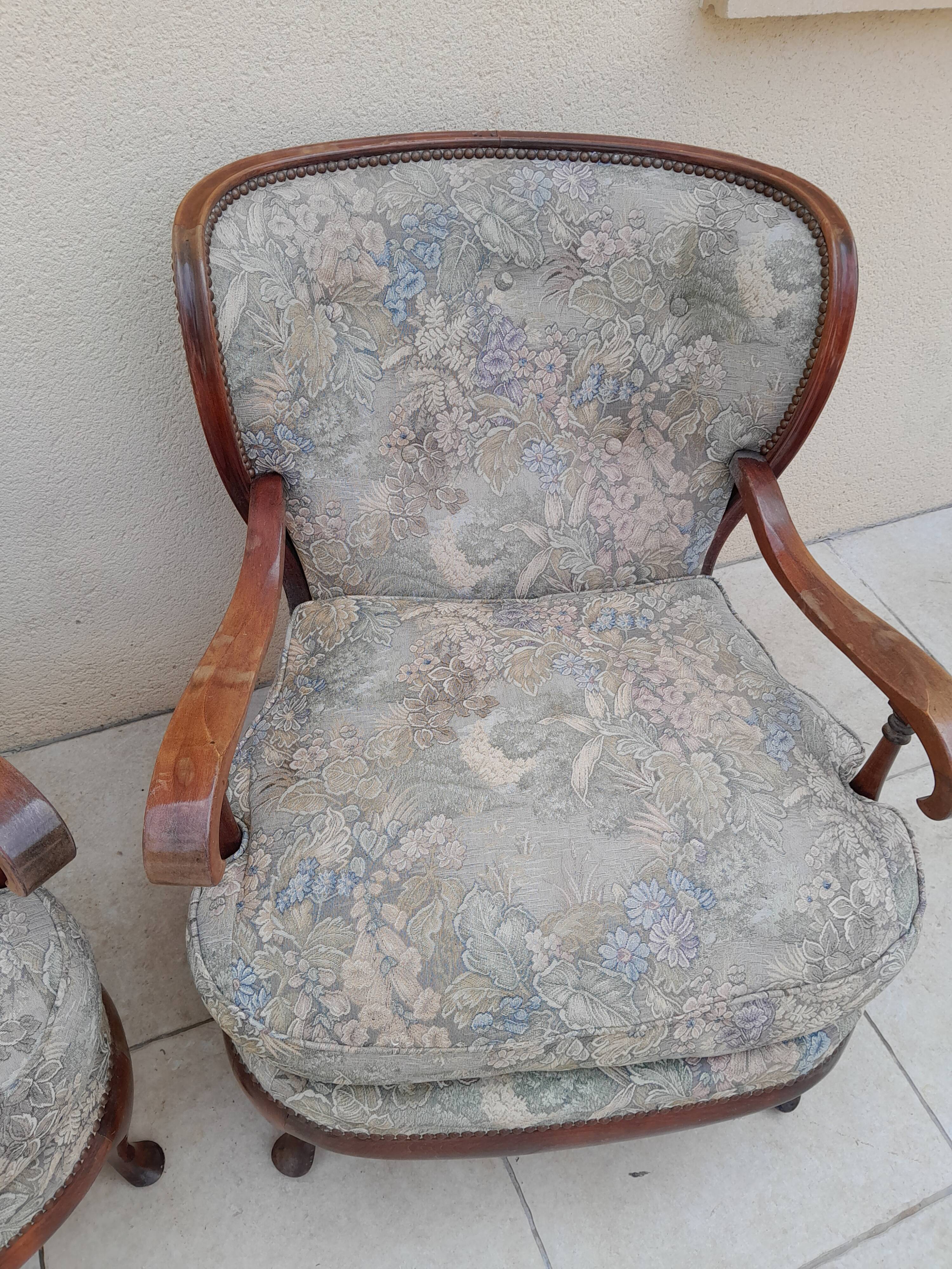 Pair of vintage antique bergère armchairs