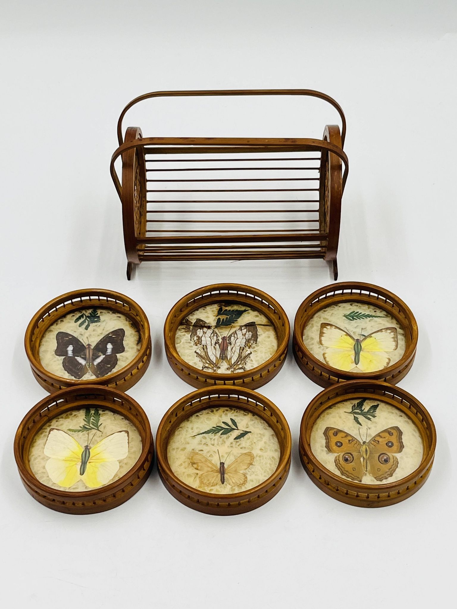 Vintage wooden coaster holder with 6 butterfly coasters.