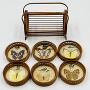 Vintage wooden coaster holder with 6 butterfly coasters.