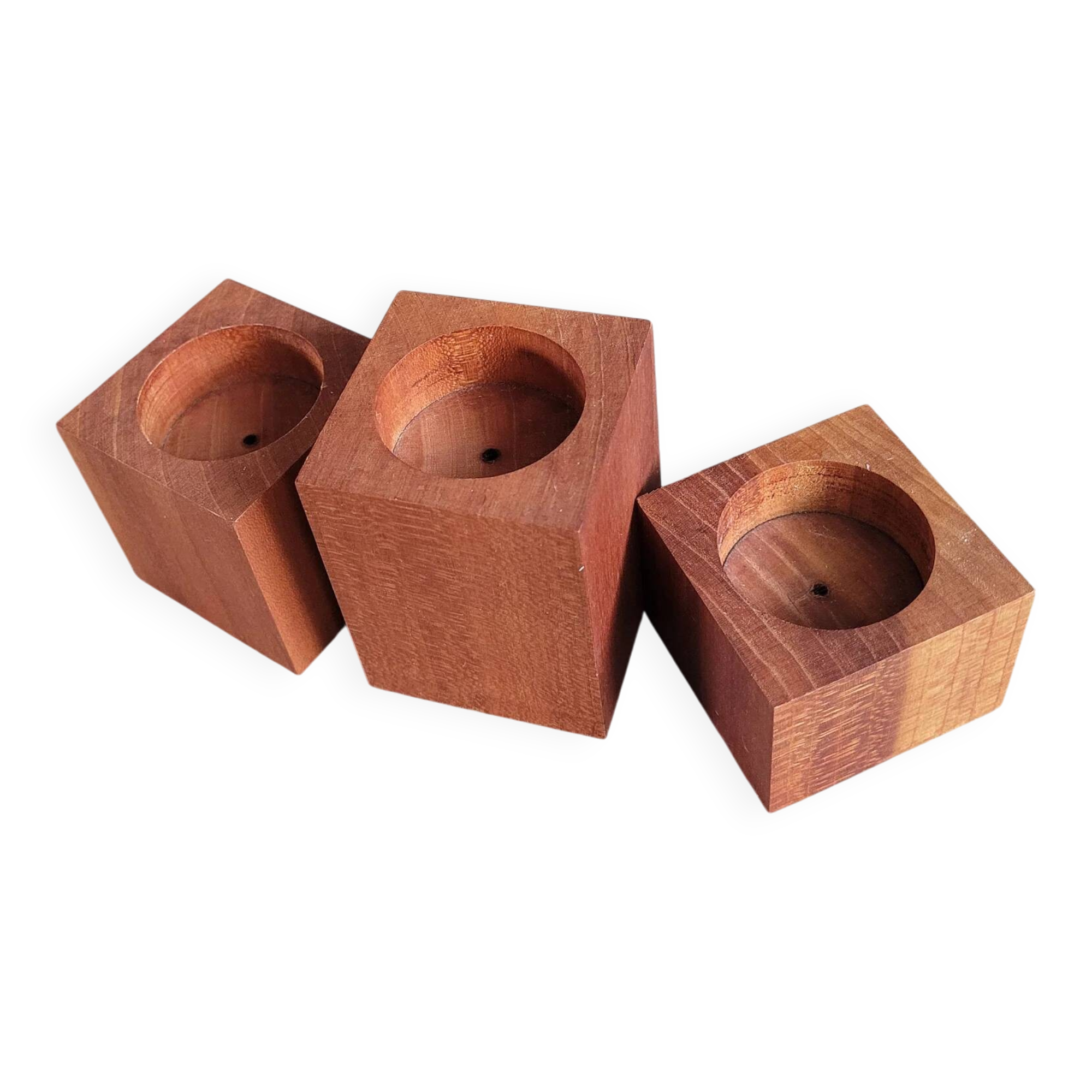 Vintage teak candlestick trio