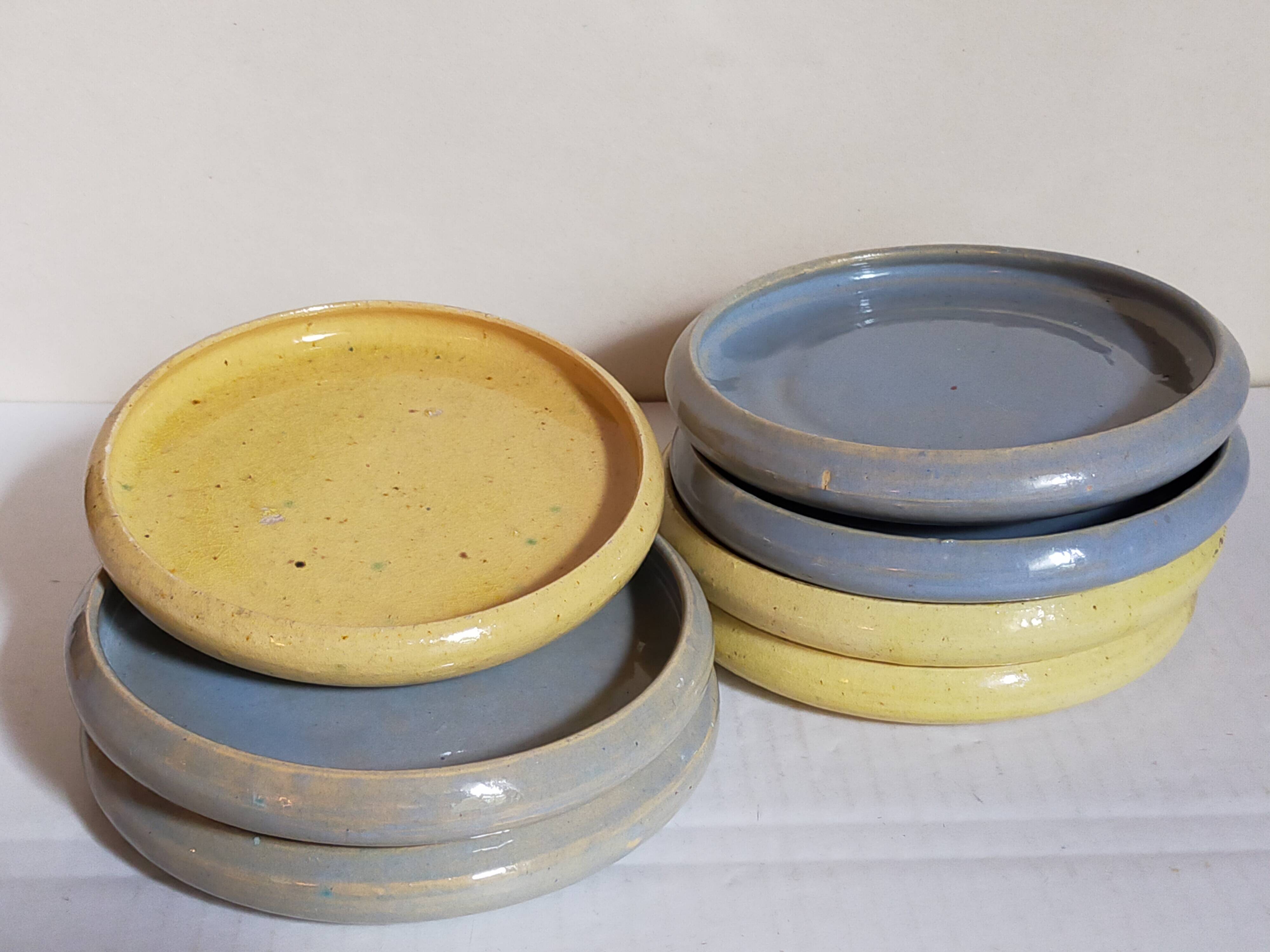 Seven vintage potter's sweet treat plates