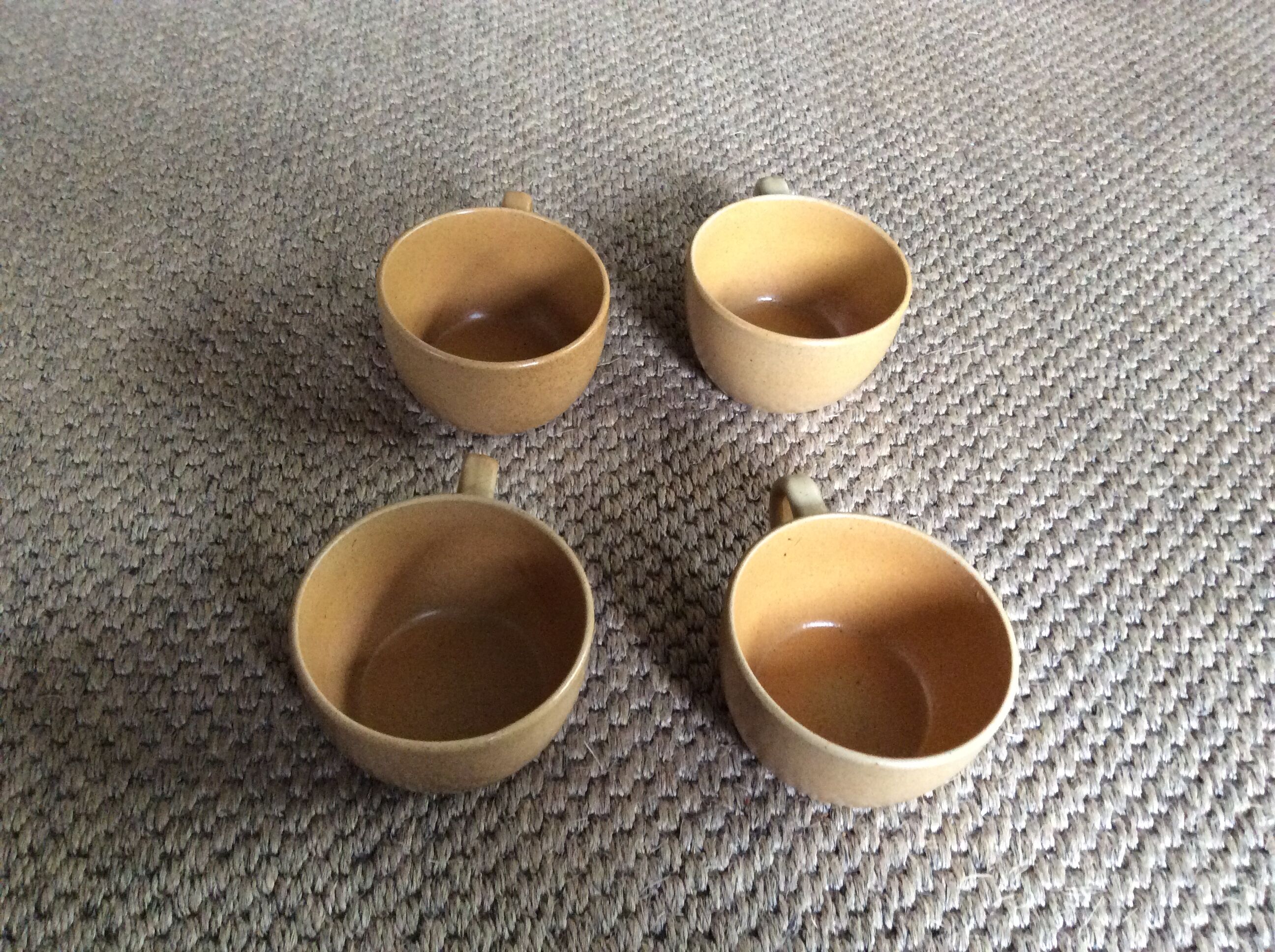 Series of 4 sandstone cups