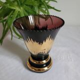 Flared vase in purple glass with a central gold motif