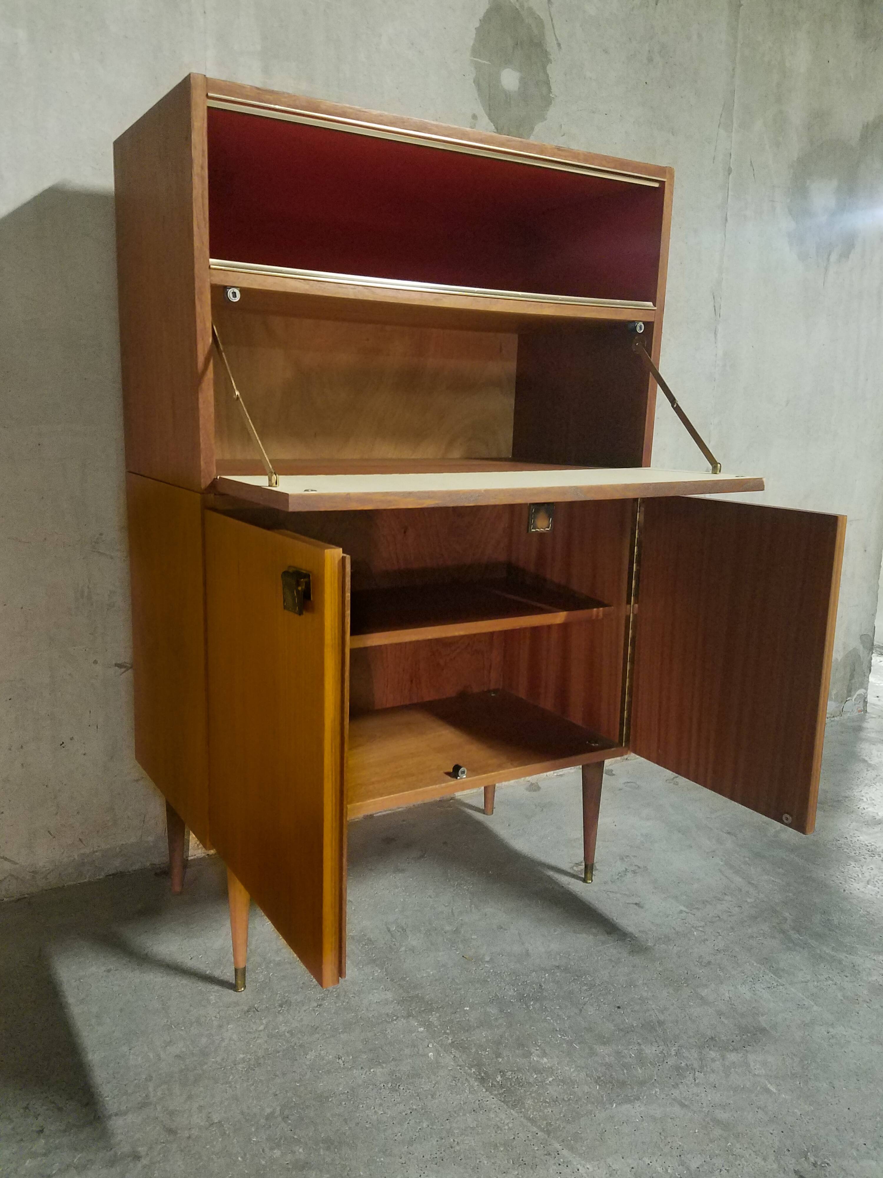 Teak bar cabinet and teak veneer, saddle leather and brass handles