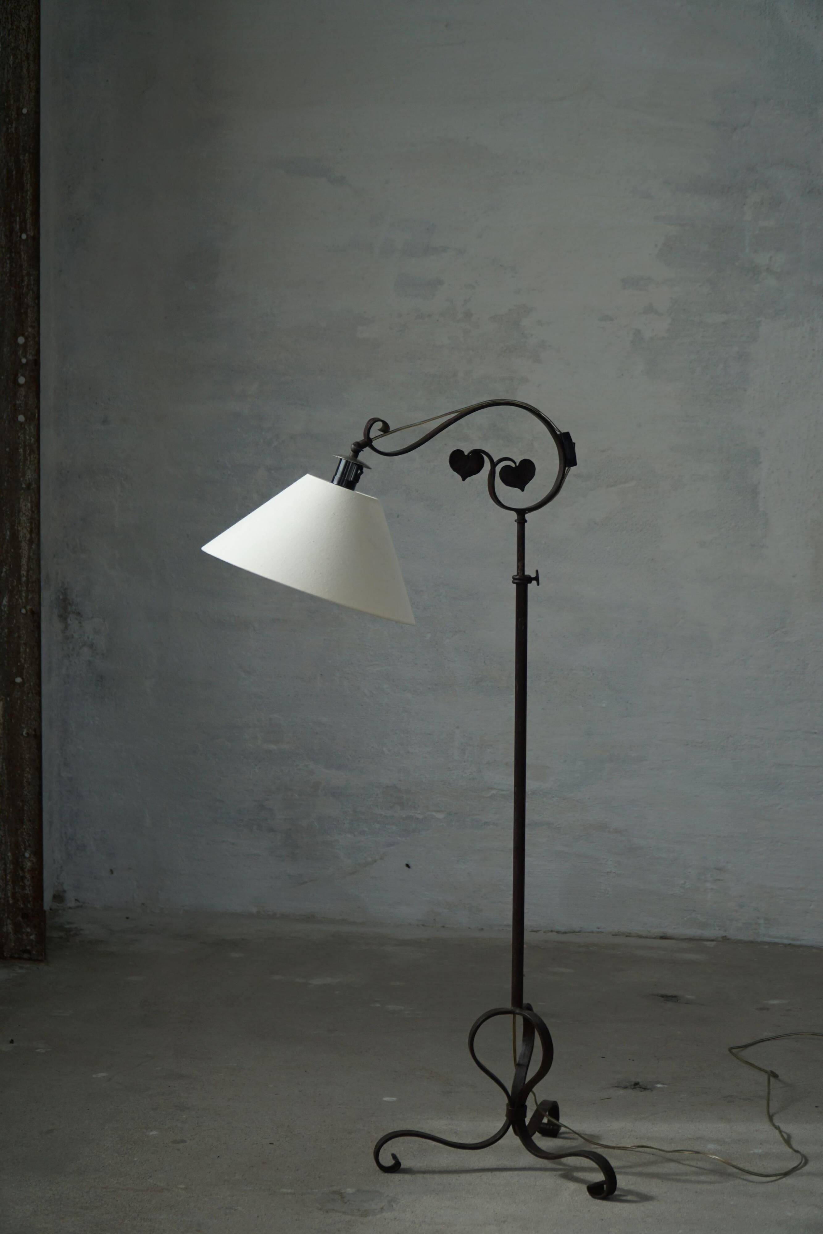 Danish Art Deco, adjustable wrought iron floor lamp, 1930s