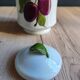 Porcelain jam pot with hand-painted plum design, signed sweet jar.
