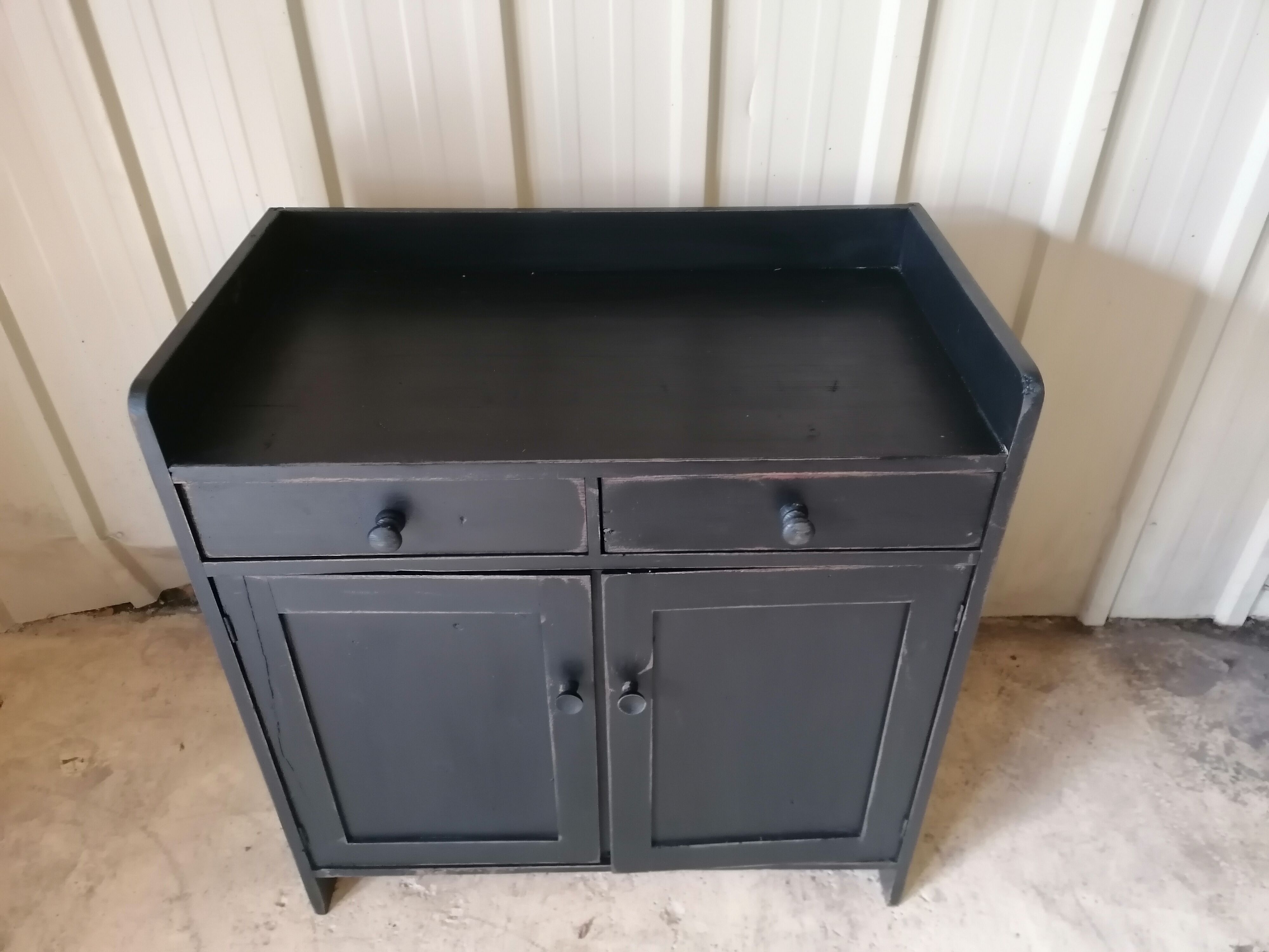 Low wooden entrance furniture