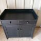 Low wooden entrance furniture