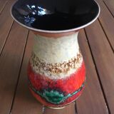 Ceramic vase with flowing glaze in shimmering colors. Numbered 1407/25