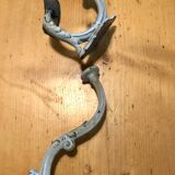 Enamelled cast iron coat hook