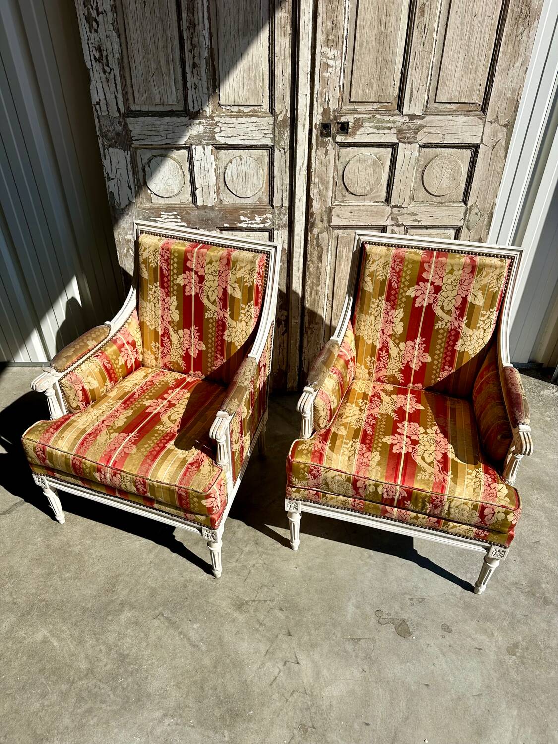 Pair of Louis XVI lacquered bergere chairs circa 1950