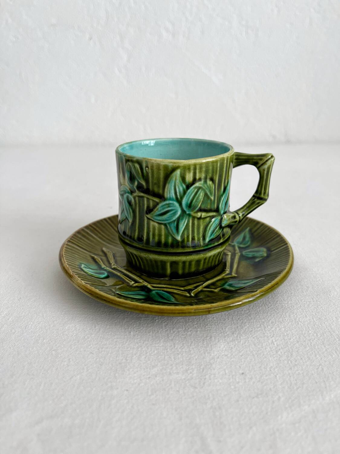 Antique earthenware coffee cup in bamboo slip