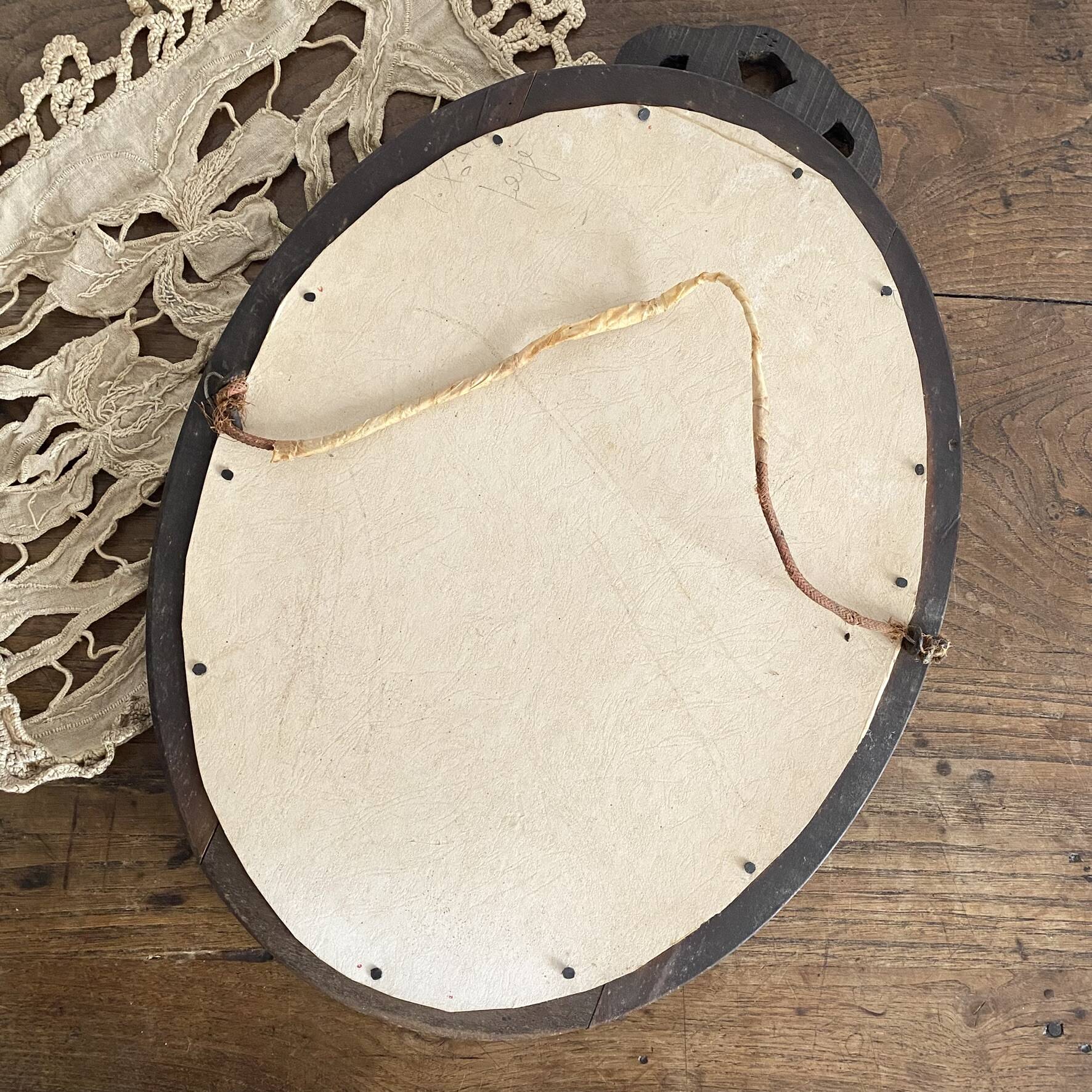 Miroir ovale mercure en bois sculpté décor nœud ruban 37X52