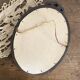 Miroir ovale mercure en bois sculpté décor nœud ruban 37X52