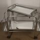 Vintage 1970s rolling dessert trolley in chrome metal and mirrored glass.
