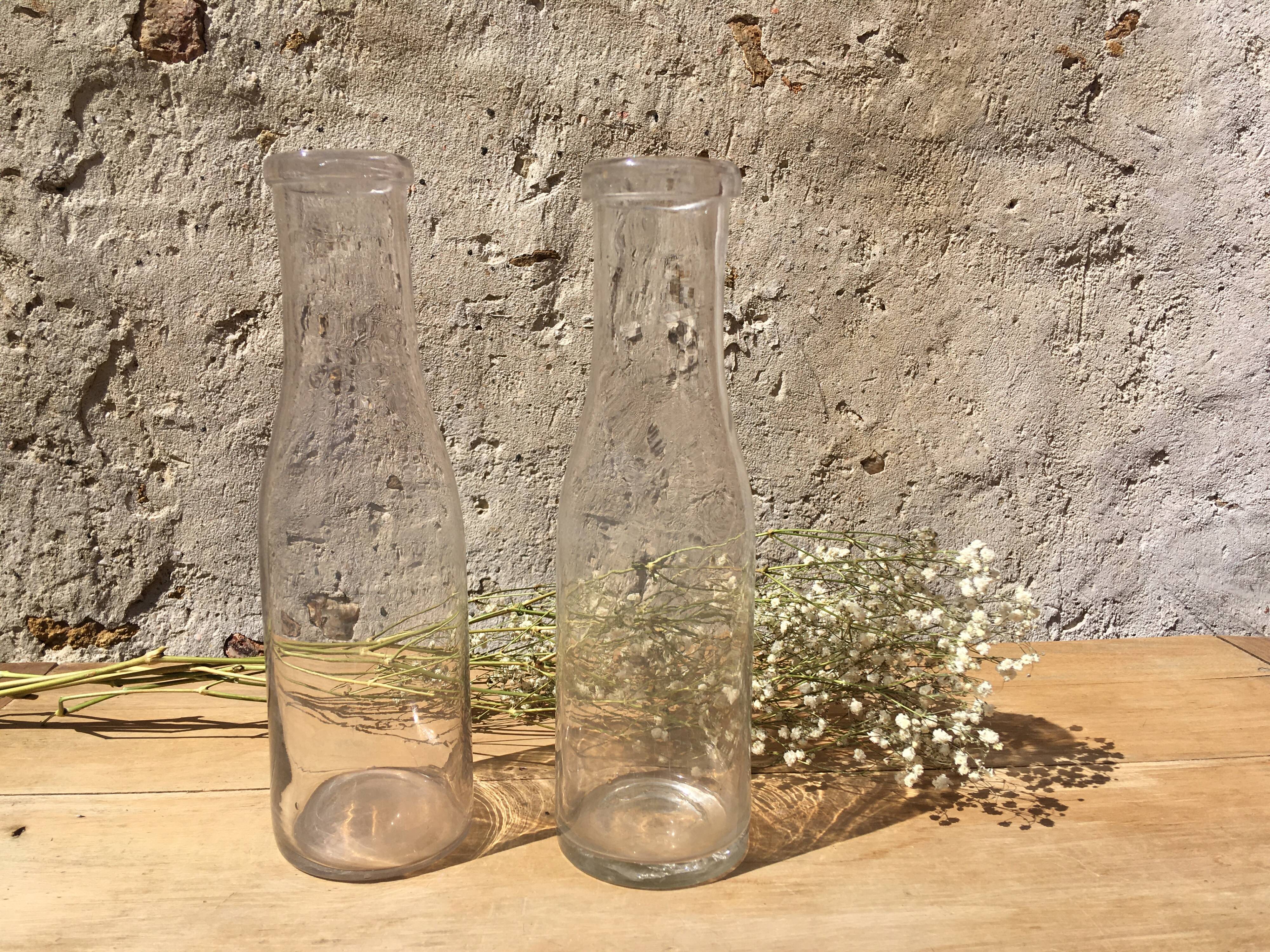 Pair of old milk bottles