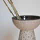 Minimalist gray ceramic vase in design shape