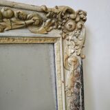 Ancient mirror carved entourage