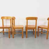 Suite of a round table with extension and 4 vintage pine chairs from the 60s and 70s