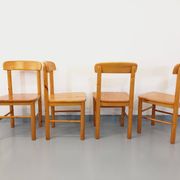 Suite of a round table with extension and 4 vintage pine chairs from the 60s and 70s