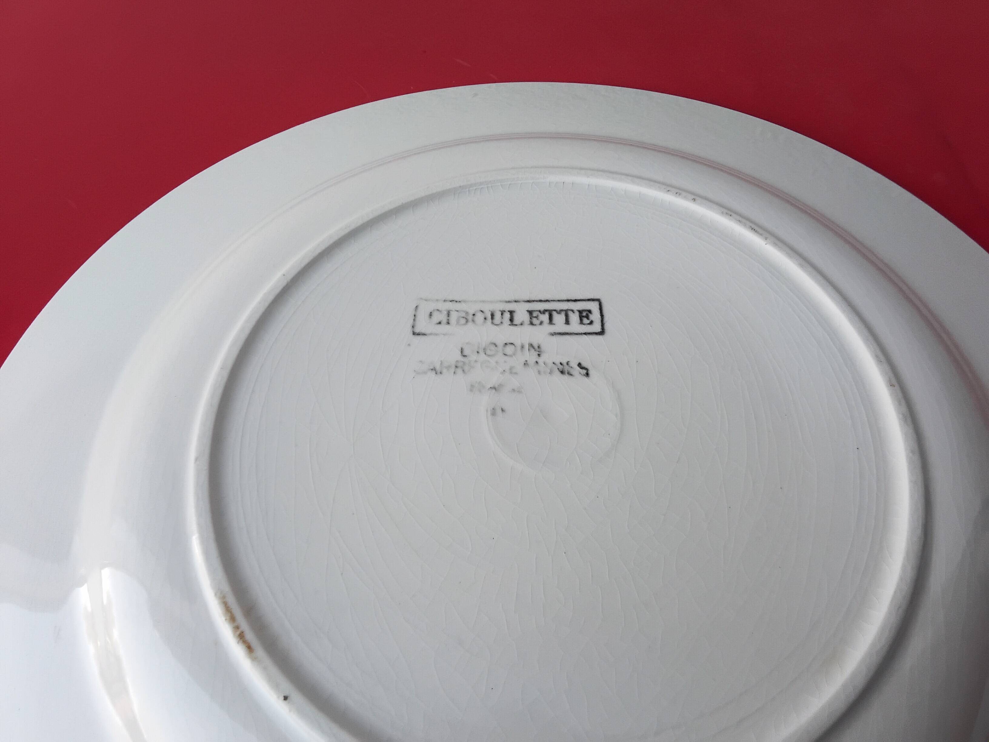 Set of four Digoin Sarreguemines flat plates
