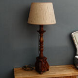 Carved wooden lamp, fiber shade