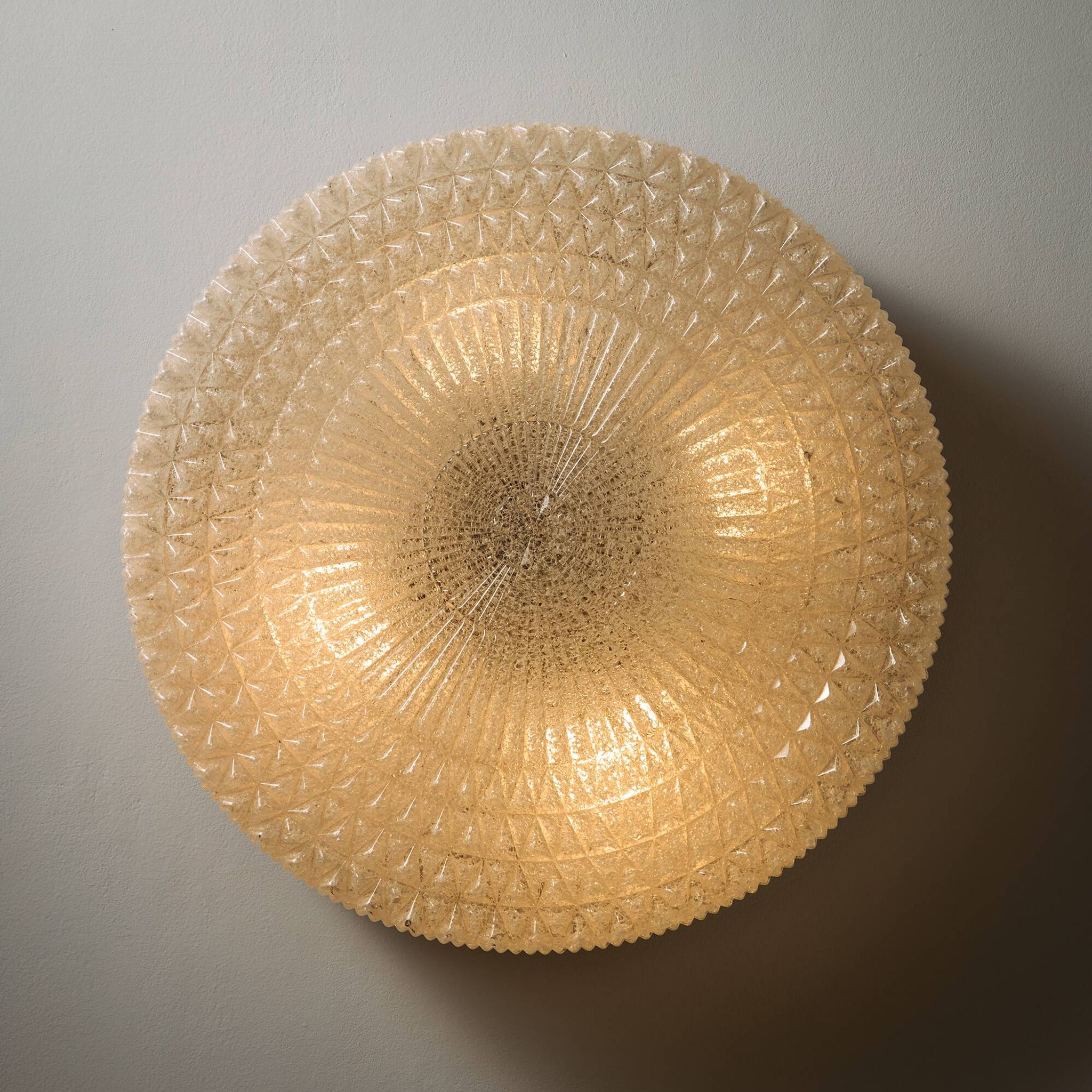 Wall light in metal and plastic
