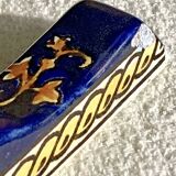 10 anciens porte couteau Gien Renaissance fond bleu
