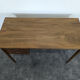 Scandinavian teak desk with a suspended drawer unit.