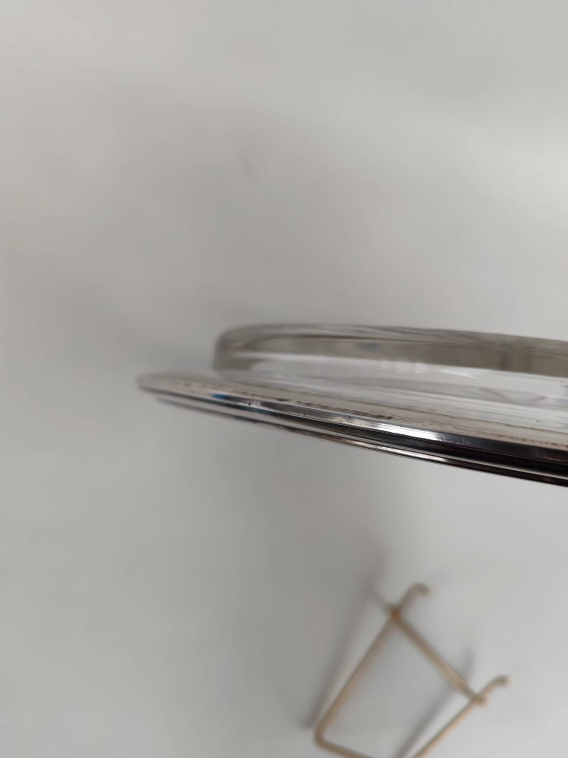 Cut crystal tray and solid silver rim.