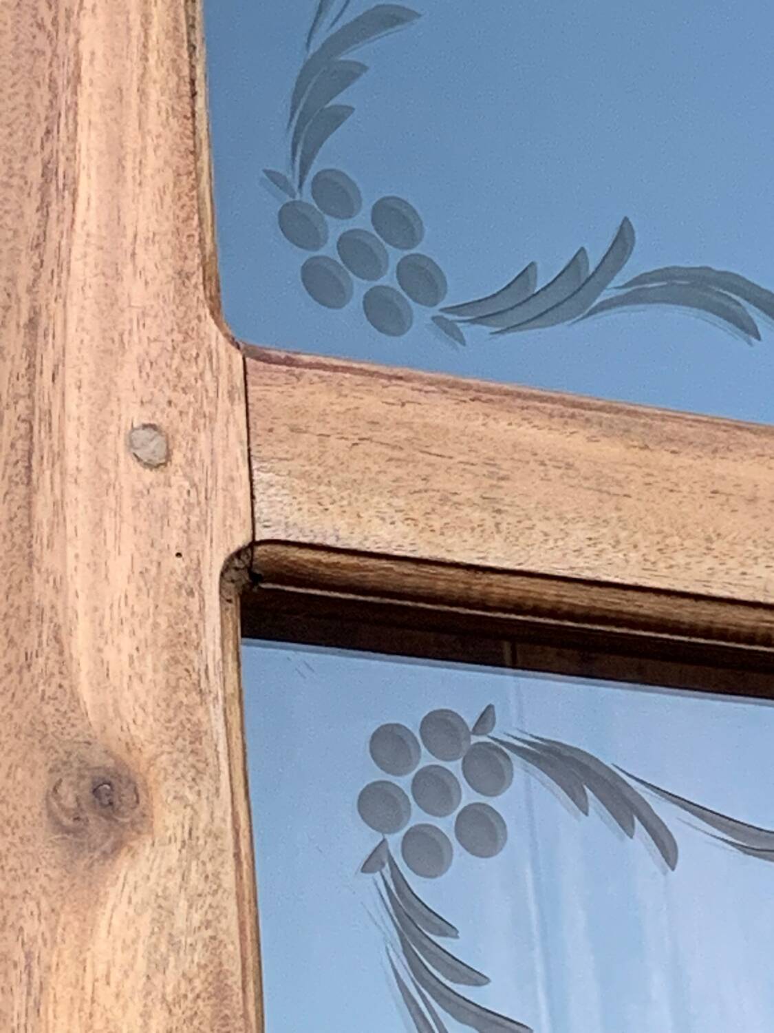 Parisian wardrobe in raw wood with engraved glass from 1920.