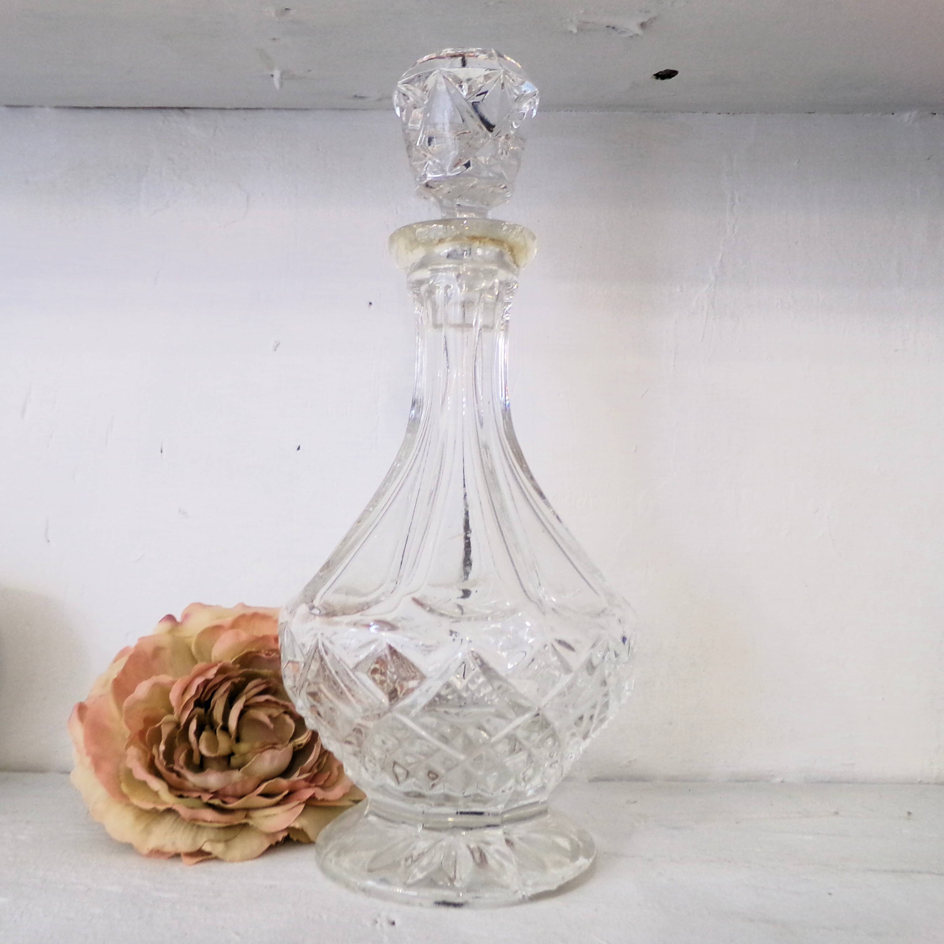 Cut glass liqueur carafe with a faceted stopper