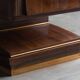 Art Deco walnut sideboard with brass details and sculptural base, France, 1930s