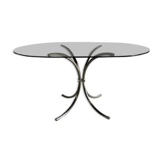 Oval table in smoked glass and chrome steel