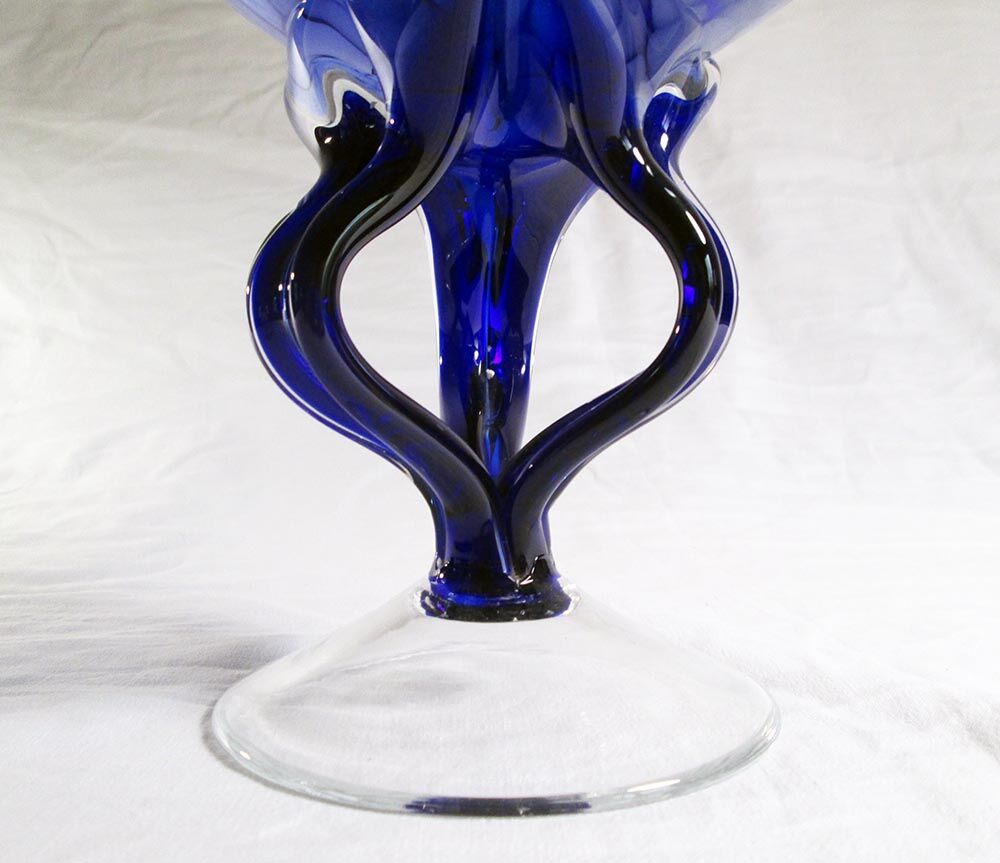 Blue glass cup on foot