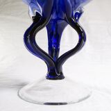 Blue glass cup on foot