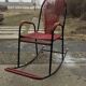Vintage red metal rocking chair, graphic plastic cord with fan backrest, 1960s.