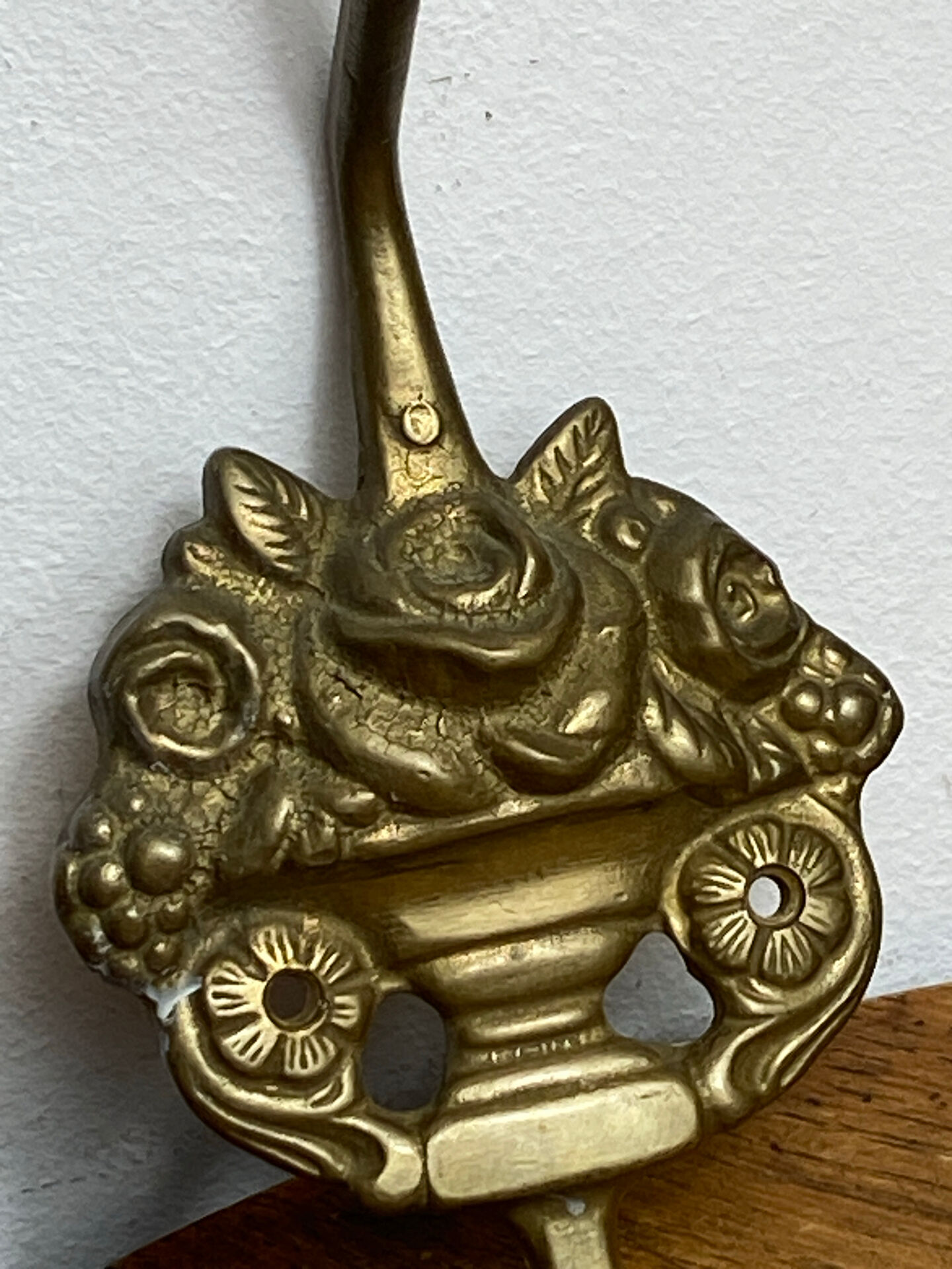 Wall-mounted brass hook
