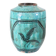 Chinese glazed earthenware vase with bird and flower decoration on a green background