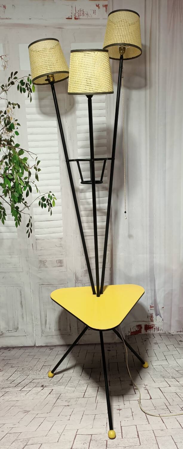Mid-century tripod floor lamp with 3 lights and a yellow shelf.