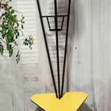 Mid-century tripod floor lamp with 3 lights and a yellow shelf.