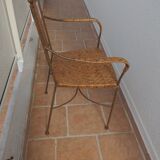 Wicker armchair and wrought iron