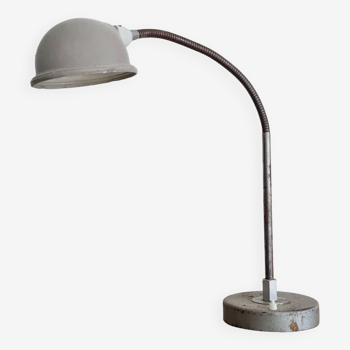 Articulated metal lamp