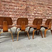 Set of 4 DCW chairs in walnut, Charles & Ray Eames, Herman Miller, 1950s