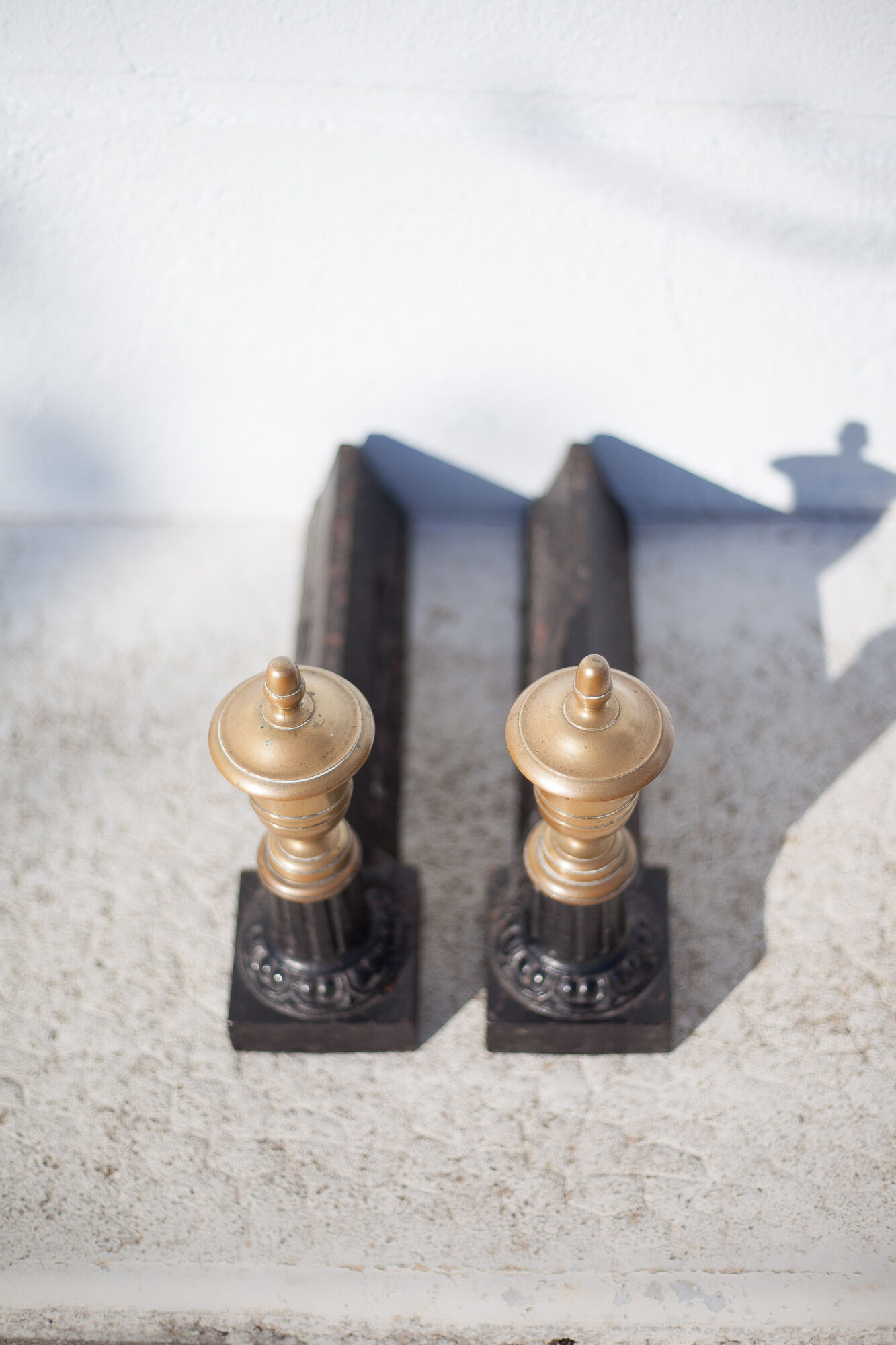 Cast iron and brass chenets
