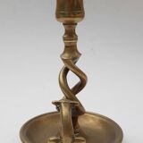 Antique bronze candlestick with dragon-shaped handle from the 17th century