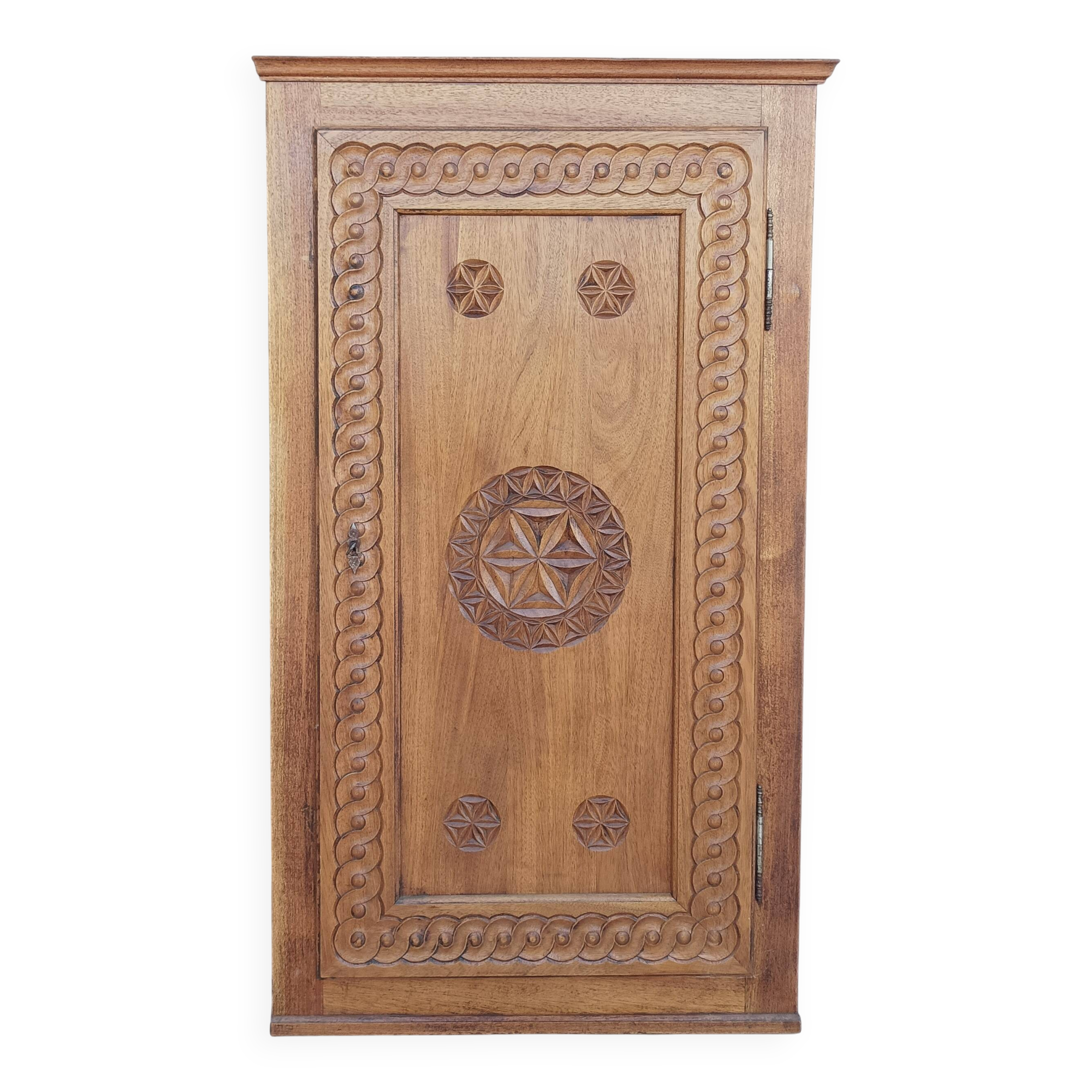 Corner cabinet in carved walnut, Savoyard style.