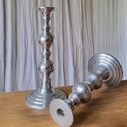 Pair of antique chrome metal candlesticks